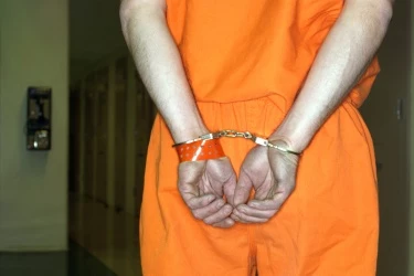 Handcuffed_Comstock